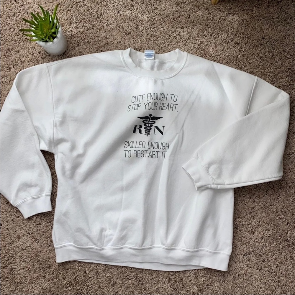 RN Sweater ”Cute enough to stop your heart, skilled enough to restart it”